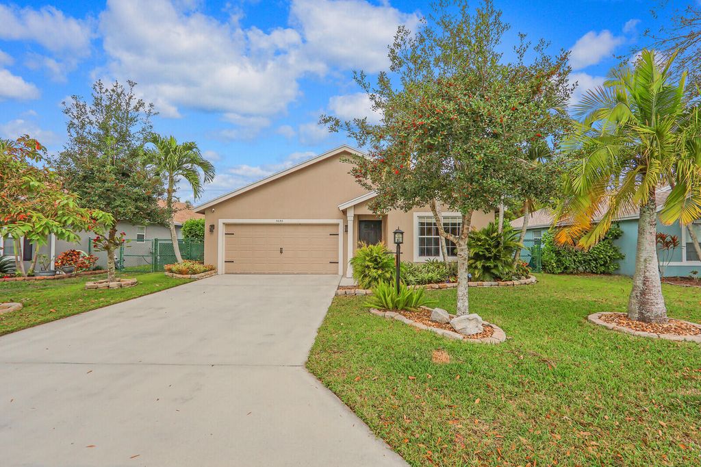 Photo of 9030 SW Caprice Circle, Stuart, FL 34997 (MLS # R11059610)