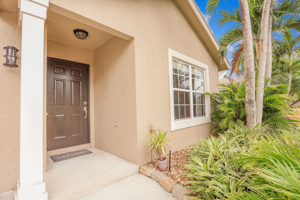 Photo of 9030 SW Caprice Circle, Stuart, FL 34997 (MLS # R11059610)