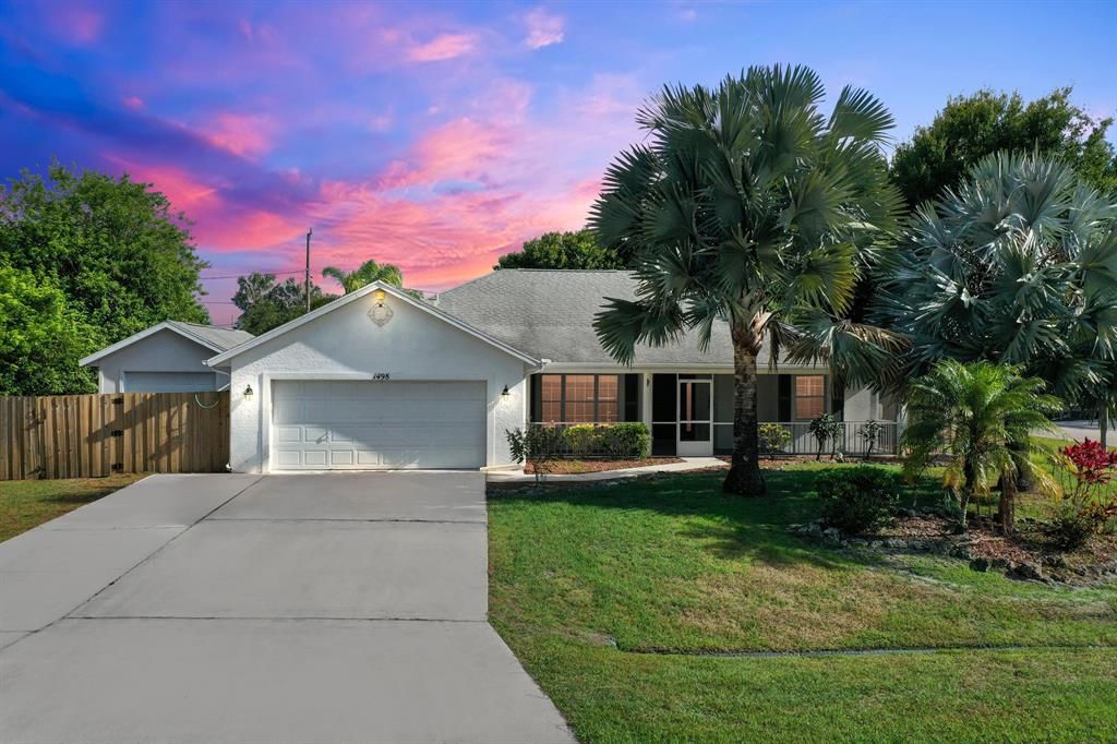 Photo of 1498 SW Malaga Avenue, Port Saint Lucie, FL 34953 (MLS # R10720717)