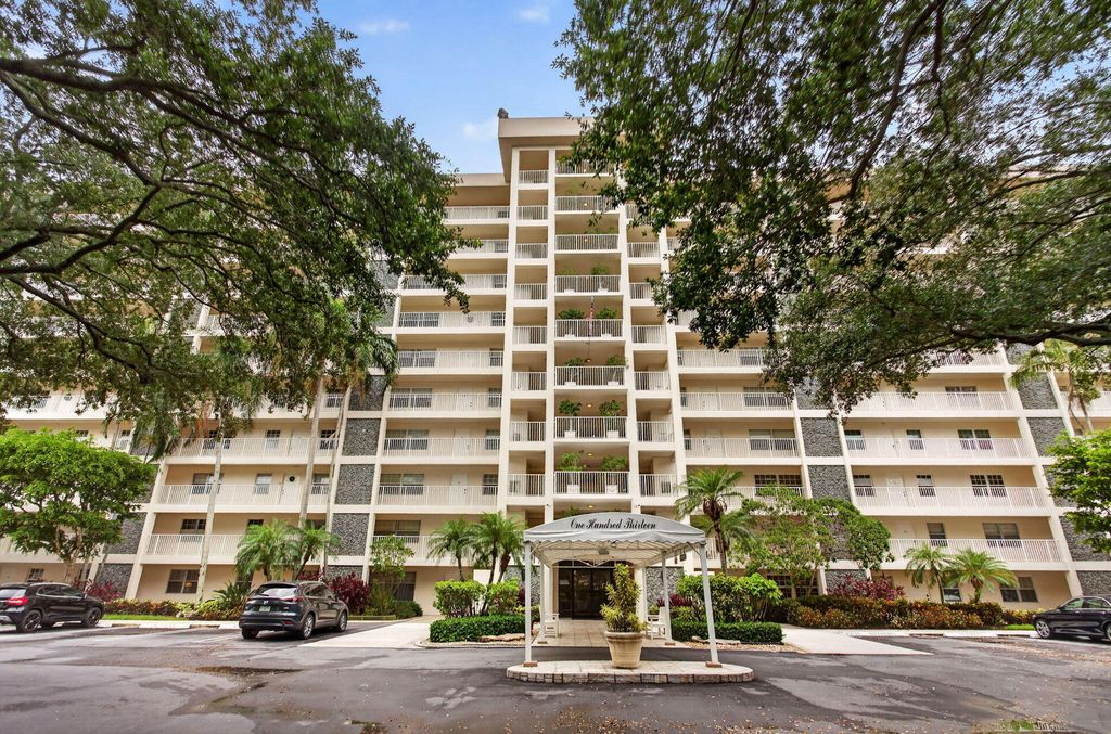 Photo of 3520 Oaks Way #110, Pompano Beach, FL 33069 (MLS # B26042290)