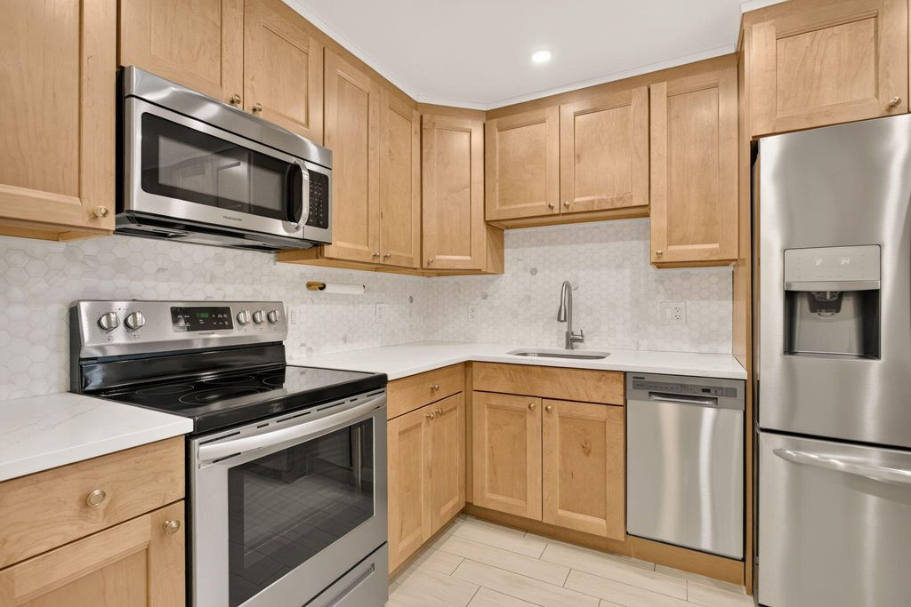 Photo of 3520 Oaks Way #110, Pompano Beach, FL 33069 (MLS # B26042290)