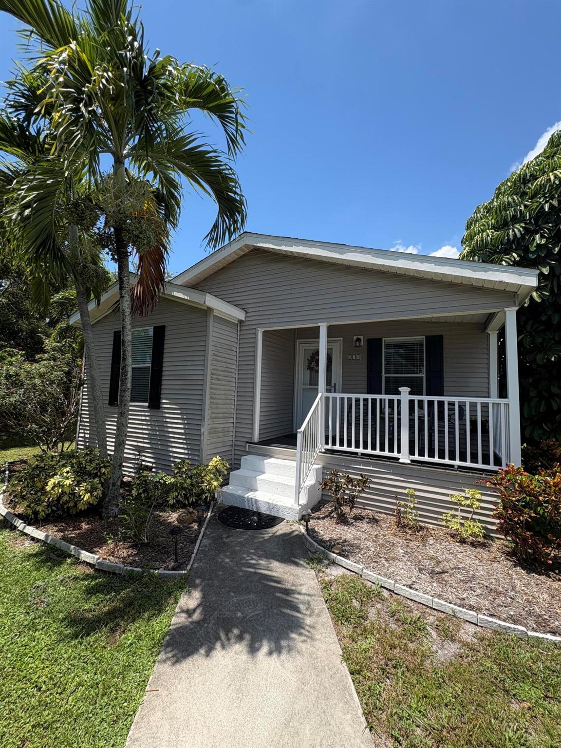 BEAUTIFUL SPACIOUS OPEN FLOOR PLAN WITH LOTS OF ROOM. NEWER ROOF AND APPLIANCES. WASHER AND DRYER INSIDE THE UNIT. ENCLOSED BACK PORCH WITH PRIVACY YARD. GREAT LOCATION NEAR RESTUARANTS AND LOTS OF UPSCALE SHOPPING AND CLOSE TO PARKS AND BEAUTIFUL BEACHES. MAINTANCE INCLUDES, COMMON GROUNDS, LAWN SERVICE, WATER/SEWER, SPRINKLERS, BASIC CABLE, WATER, REAL ESTATE TAXES. LAND LEASED SO THAT INCLUDES YOUR PROPERTY TAXES. THIS HOME HAS PERGO LAMINATE FLOORS THROUGHOUT AND A SHED FOR STORAGE. DEALER #BH/1151174/1