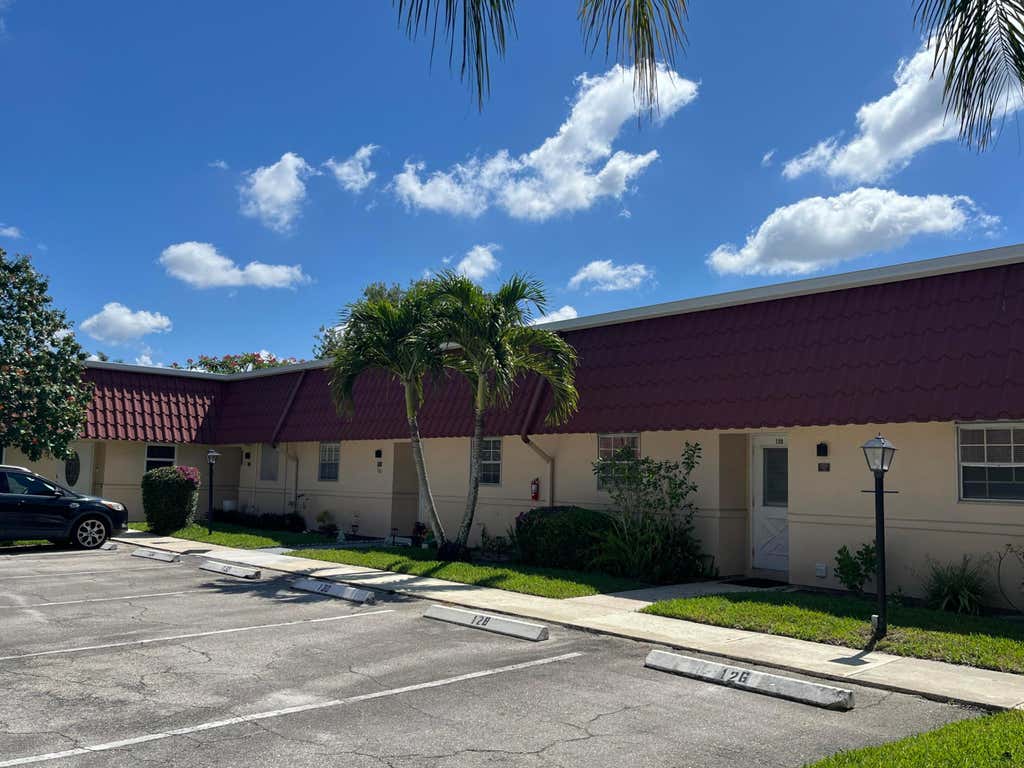 Photo of 130 Amherst Lane, Lake Worth, FL 33467 (MLS # R10989916)