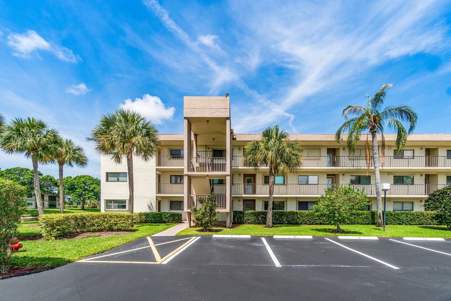 Beautifully renovated 2 bed, 2 bath condo located in the vibrant 55+ Lakes of Delray community. This residence offers a stunning wide lake view that can be enjoyed from the dining room, living room, patio and primary bedroom creating a serene and picturesque setting .  The kitchen features stainless steel appliances complemented by stylish cabinetry, providing functionality and modern appeal. Hurricane impact sliding glass doors lead from the patio directly to the lakeside. All windows are fitted with accordian  hurricane shutters. The unit is finished with tile flooring throughout, enhancing both durability and elegance. A separate laundry room includes a brand new washer and dryer and is spaciously enough to accommodate a small office area. The community has numerous amenities.