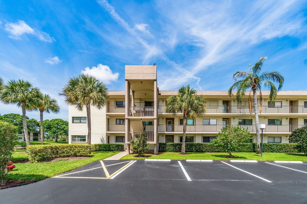 Photo of 5550 Witney Drive #102, Delray Beach, FL 33484 (MLS # B26025914)