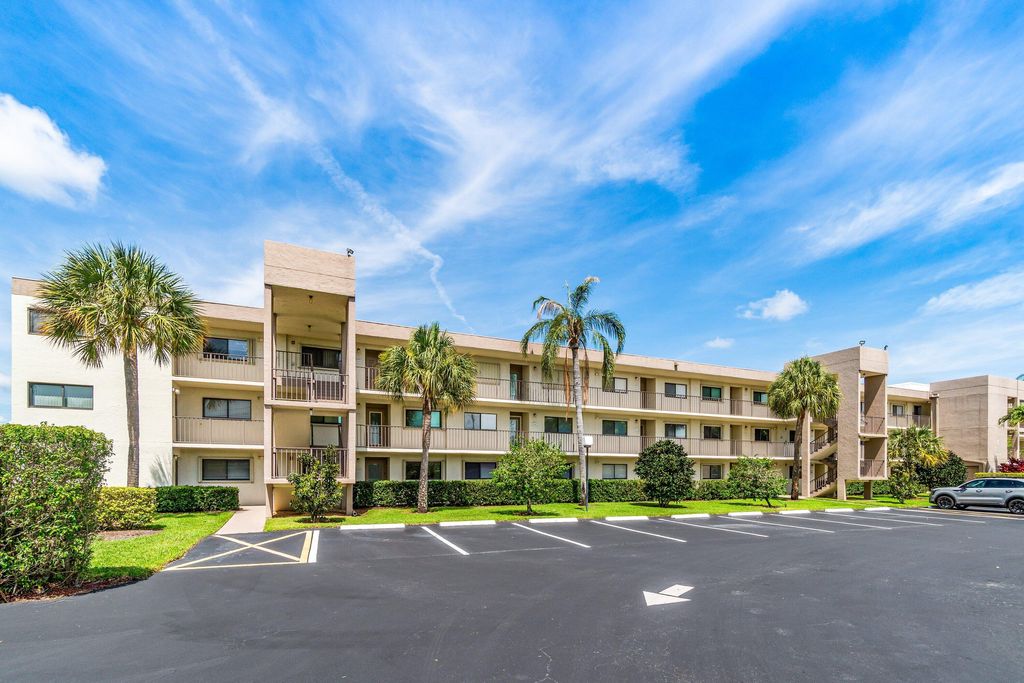 Photo of 5550 Witney Drive #102, Delray Beach, FL 33484 (MLS # B26025914)