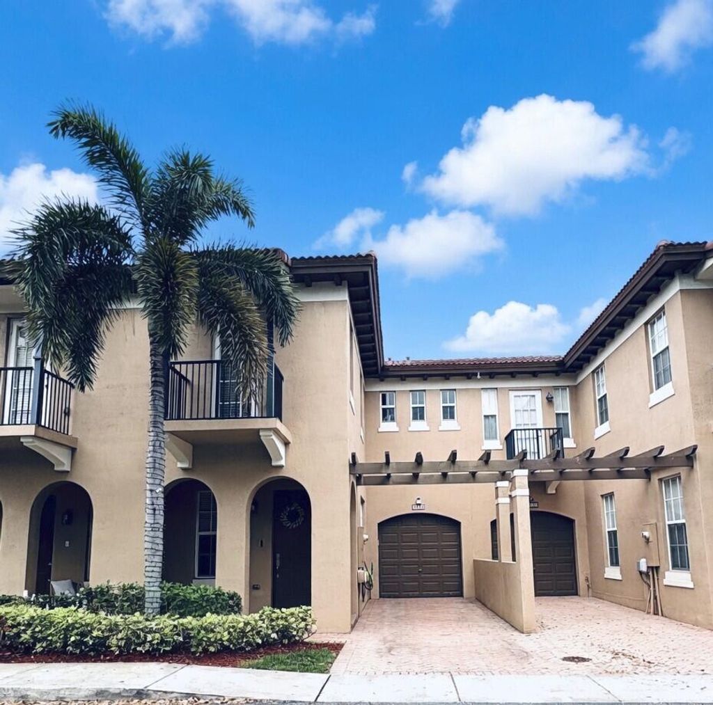 Photo of 6956 Julia Gardens Drive, Coconut Creek, FL 33073 (MLS # B26002849)