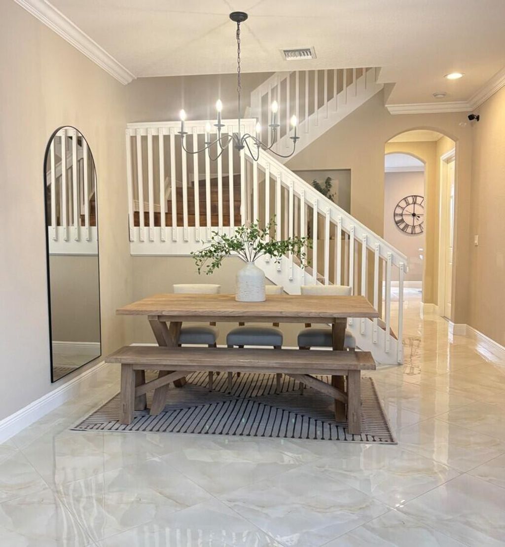 Photo of 6956 Julia Gardens Drive, Coconut Creek, FL 33073 (MLS # B26002849)