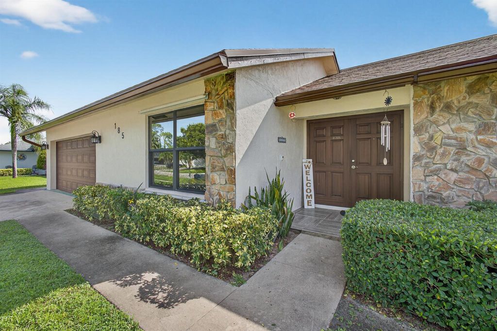 Photo of 185 Bobwhite Road, Royal Palm Beach, FL 33411 (MLS # R11123350)