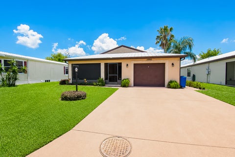 Photo of 14845 Tucan Street, Fort Pierce, FL 34951 (MLS # B26049369)