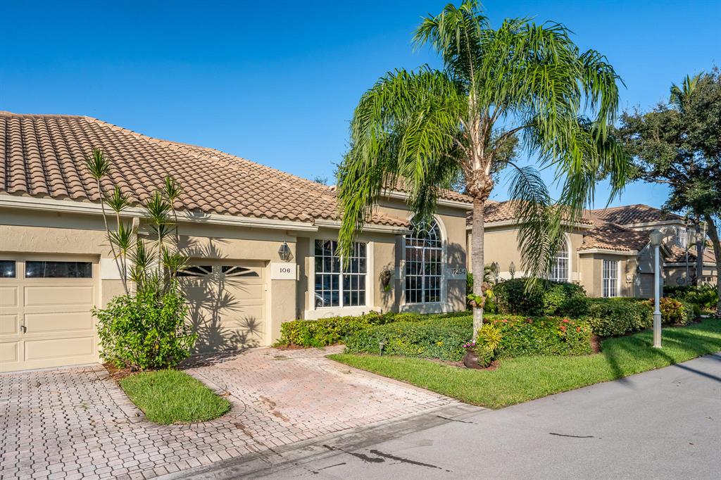 Absolutely stunning completely renovated villa with sweeping views of wide canal & golf course. This 3 bedroom 2 1/2 bath villa is loaded with designer finishes & upgrades. Porcelain plank floors throughout entire residence. Kitchen is complete with quartz counters, glass tile backsplash, custom colored LED under cabinet lighting & stainless steel appliances; it opens to large great room on one side & breakfast area on the other side with dramatic view of the canal & green landscape. Master bedroom has incredible view with sliding glass doors opening to patio/deck area overlooking large canal & fairway & includes a large custom fitted walk in closet. Sumptuous master bath with oversized frameless glass enclosed rain shower with custom tile work, beautiful, sleek bathtub & designer dual sin