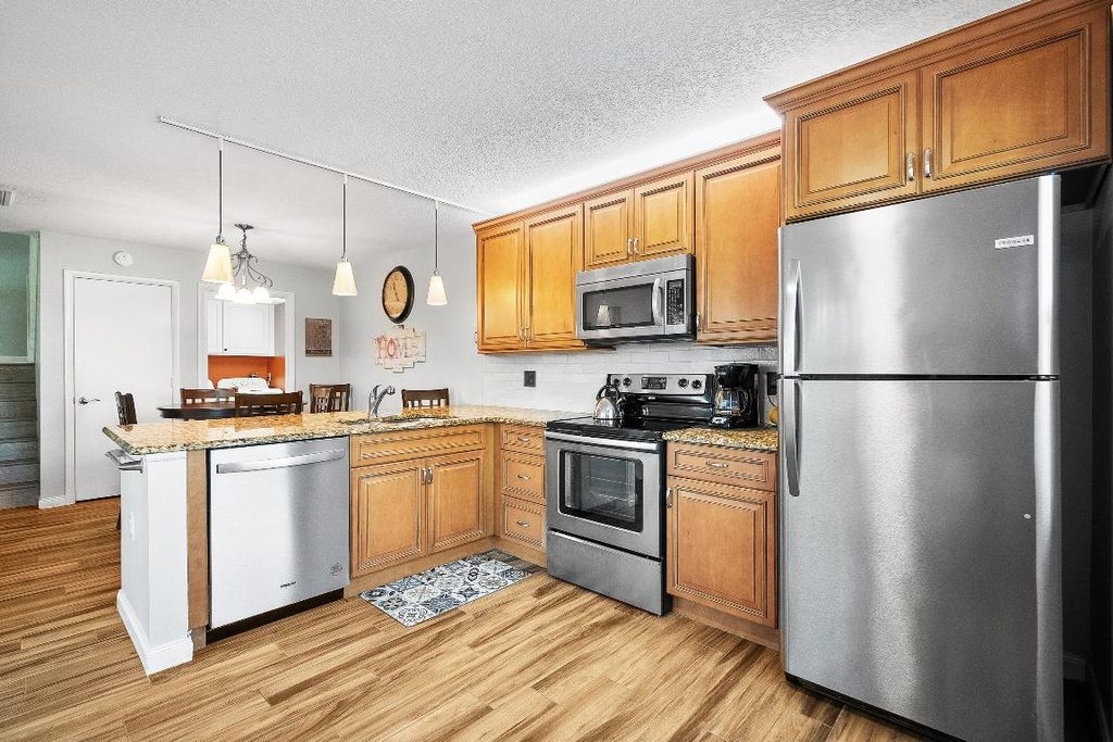 Photo of 3531 SW Sunset Trace Circle, Palm City, FL 34990 (MLS # R11081172)