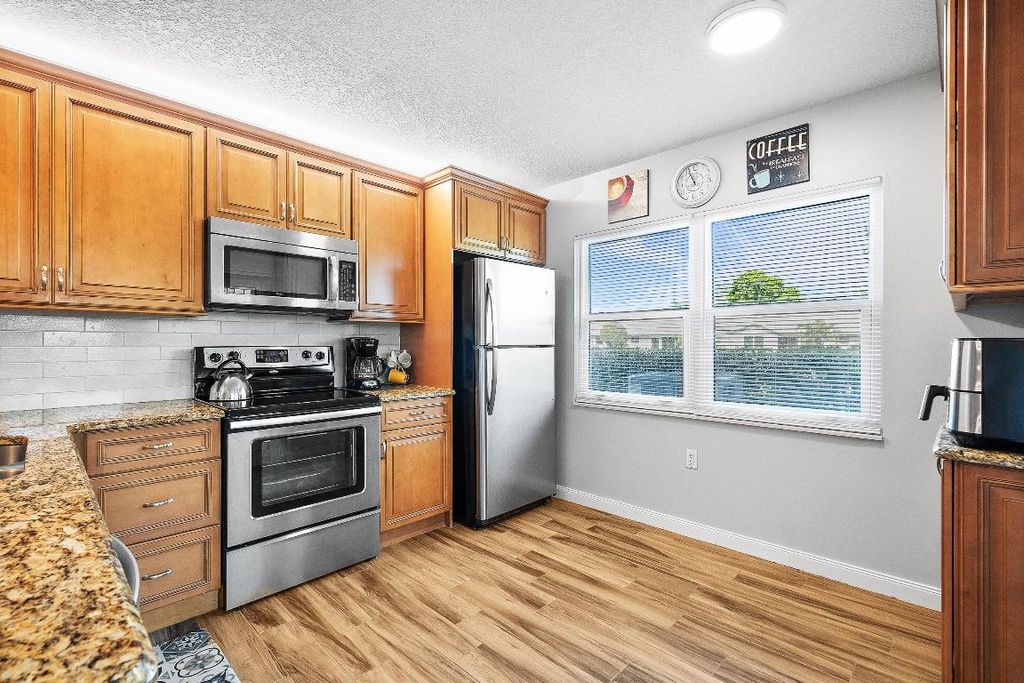 Photo of 3531 SW Sunset Trace Circle, Palm City, FL 34990 (MLS # R11081172)