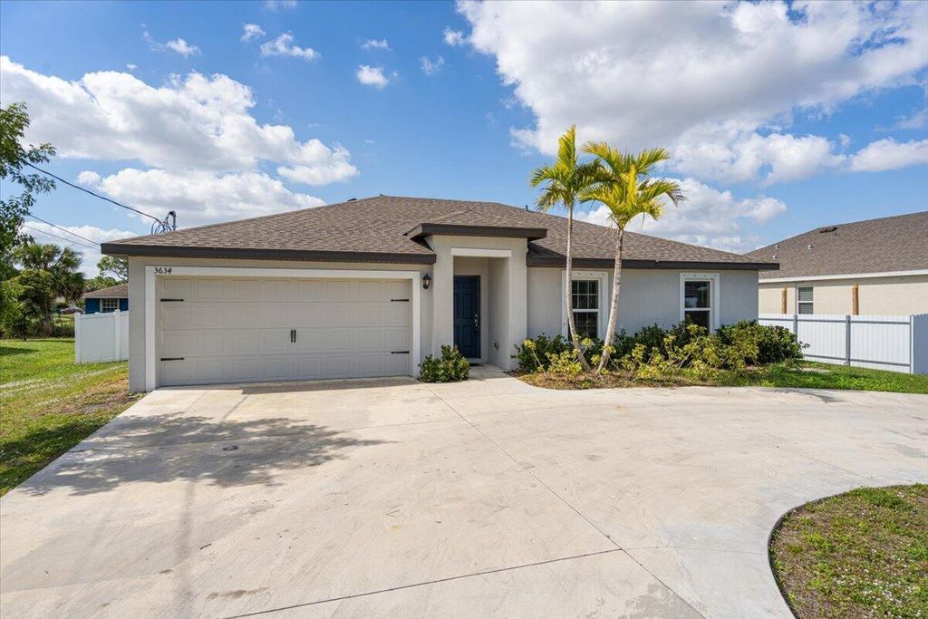 Photo of 3634 SW Port St Lucie Boulevard, Port Saint Lucie, FL 34953 (MLS # R11060930)