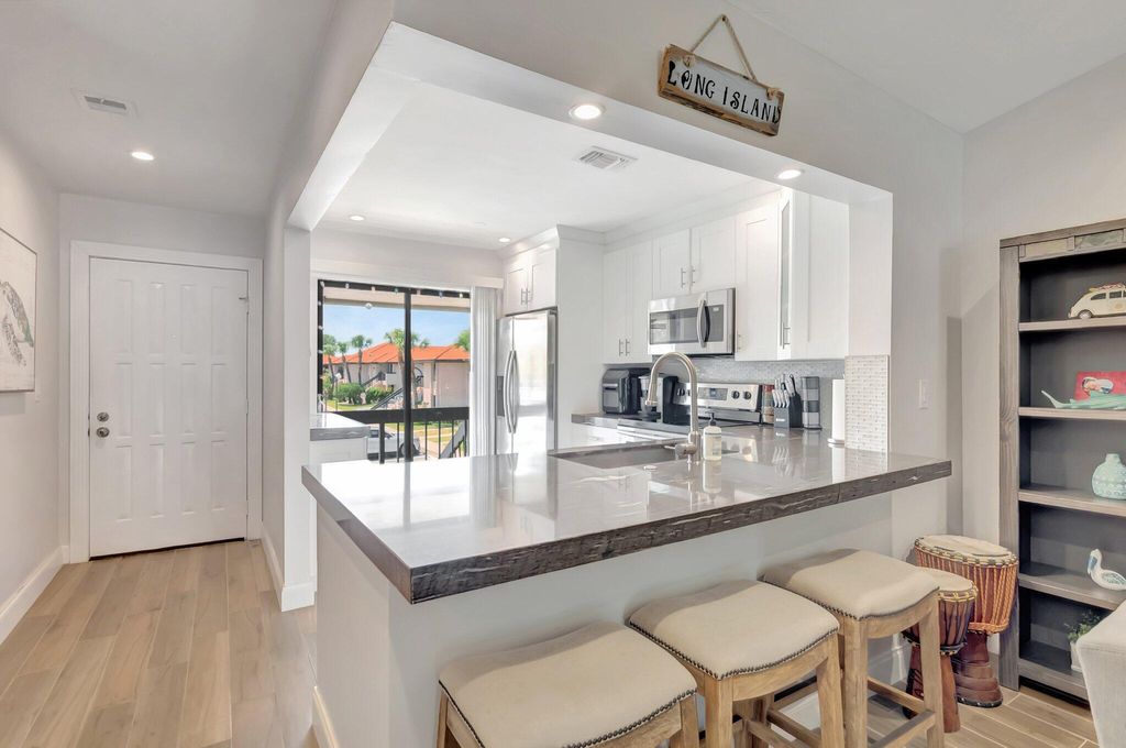 Photo of 301 Club Circle #209, Boca Raton, FL 33487 (MLS # R11078629)