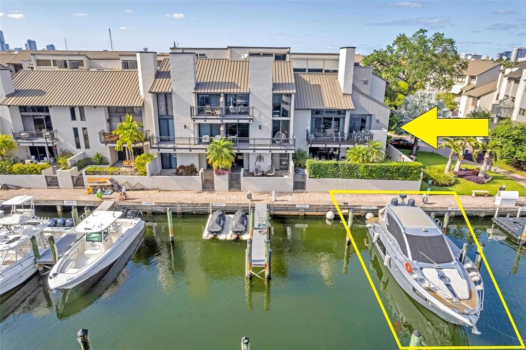 #1 LOCATION!! Incredible opportunity to own arguably the FINEST UNIT in the GATED Yachtsman’s Paradise community of Portside Yacht Club!! RARELY AVAILABLE END UNIT has more windows allowing natural light & views from everywhere! Rare OVERSIZE PRIVATE PATIO, complete w/ new hot tub, fire pits, natural gas BBQ, & retractable awning! Complete CUSTOM RENOVATION incl. PRIVATE ELEVATOR, impact windows & doors w/ automated shades, incredible Chefs kitchen, spa-style bathrooms, & full SMART HOME technology! 55’ PROTECTED DEEPWATER SLIP & 2 car garage. OFFERED FULLY DESIGNER FURNISHED & move in ready! HEATED INFINITY POOL w/ CLUBHOUSE area. Minutes by boat to the ocean, walkable to the beach, fine dining & shopping!! Convenient to Las Olas, I-95, airport. Boat is also available for sale. Must see!!
