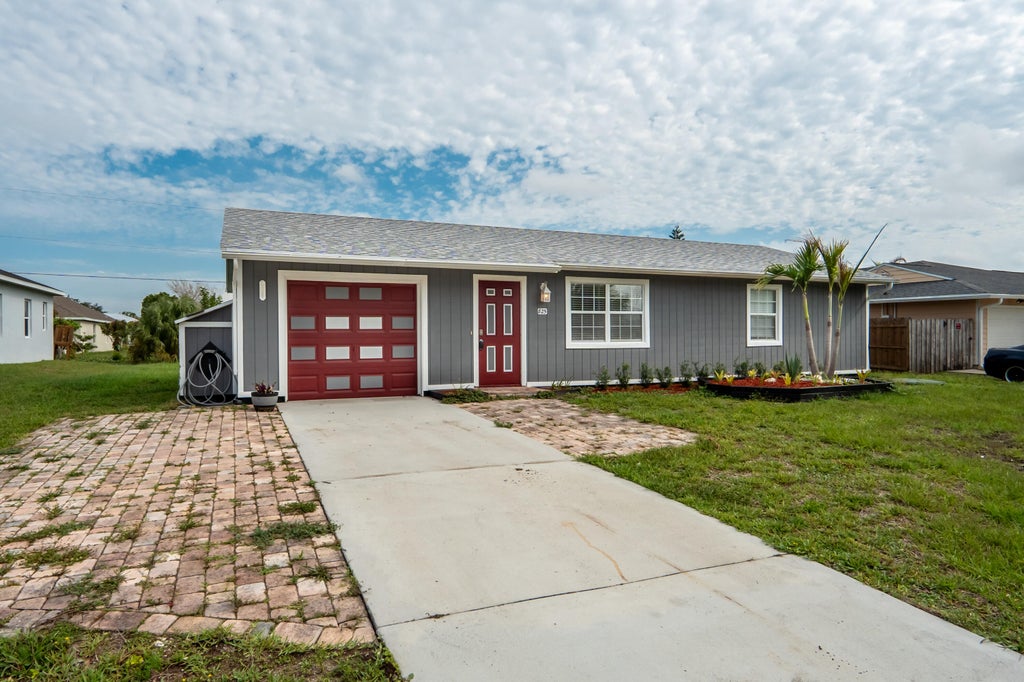 Photo of 825 SW Canary Terrace, Port Saint Lucie, FL 34953 (MLS # B26017685)