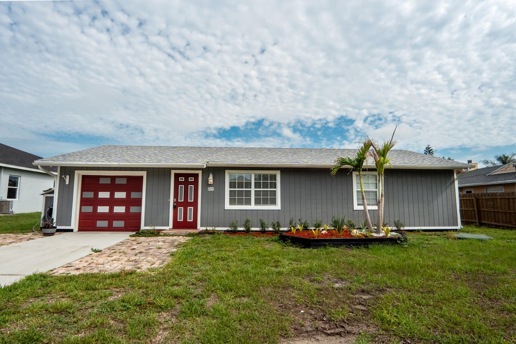 Photo of 825 SW Canary Terrace, Port Saint Lucie, FL 34953 (MLS # B26017685)