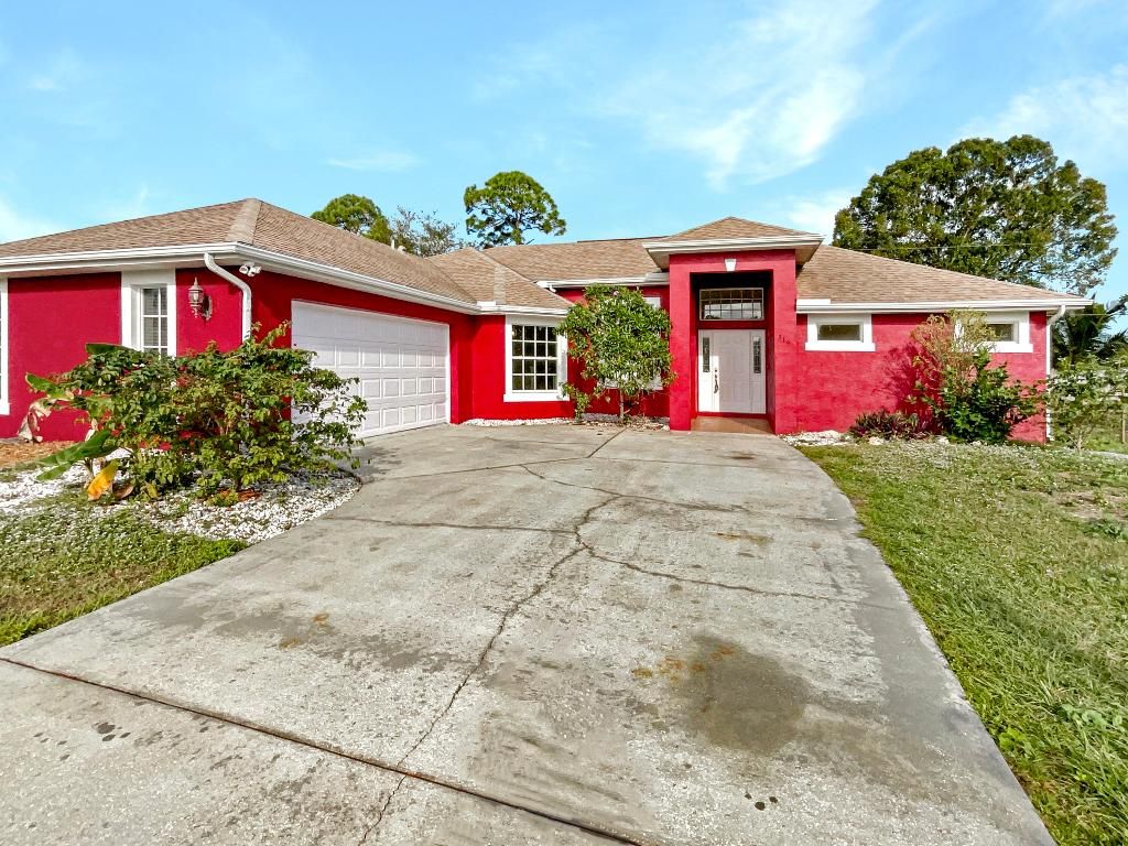 Photo of 319 SE Husted Terrace, Port Saint Lucie, FL 34983 (MLS # R10942382)