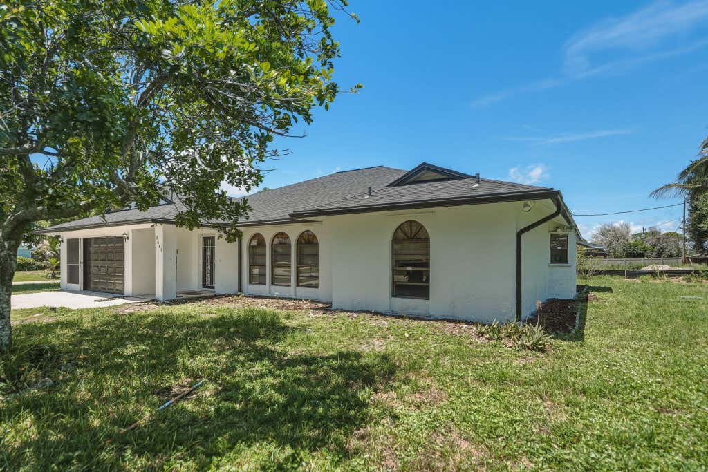 Photo of 2661 SE OSAGE Avenue, Port Saint Lucie, FL 34952 (MLS # B26063095)
