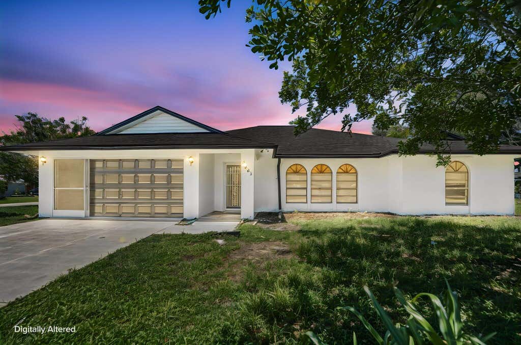 Photo of 2661 SE OSAGE Avenue, Port Saint Lucie, FL 34952 (MLS # B26063095)