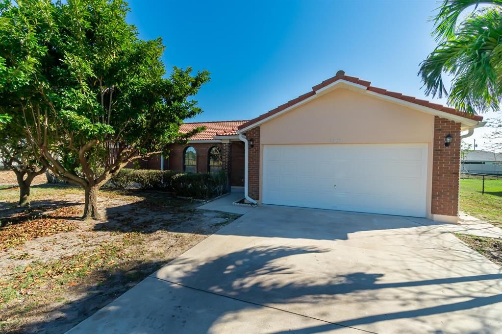 Photo of 2382 SE Tiffany Avenue, Port Saint Lucie, FL 34952 (MLS # R10779709)