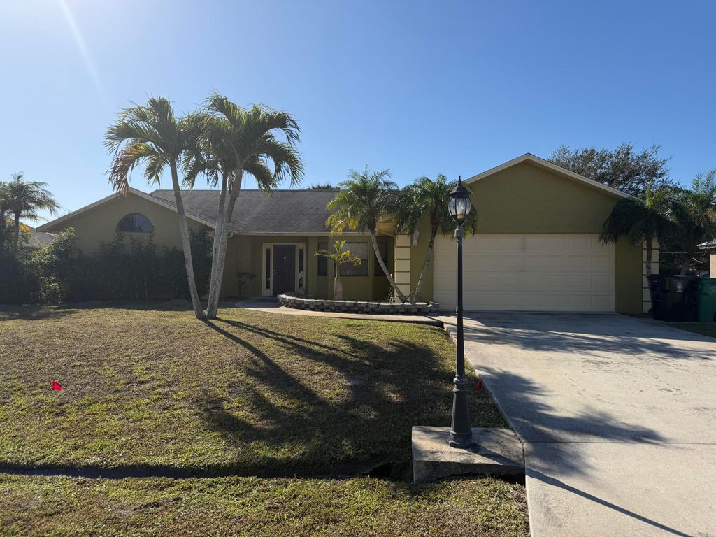 Photo of 222 SW Fairchild Avenue, Port Saint Lucie, FL 34984 (MLS # R11158658)