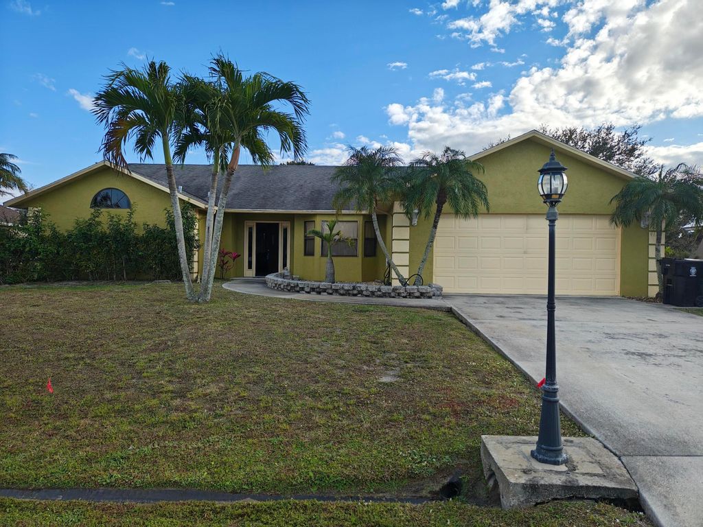 Photo of 222 SW Fairchild Avenue, Port Saint Lucie, FL 34984 (MLS # R11158658)