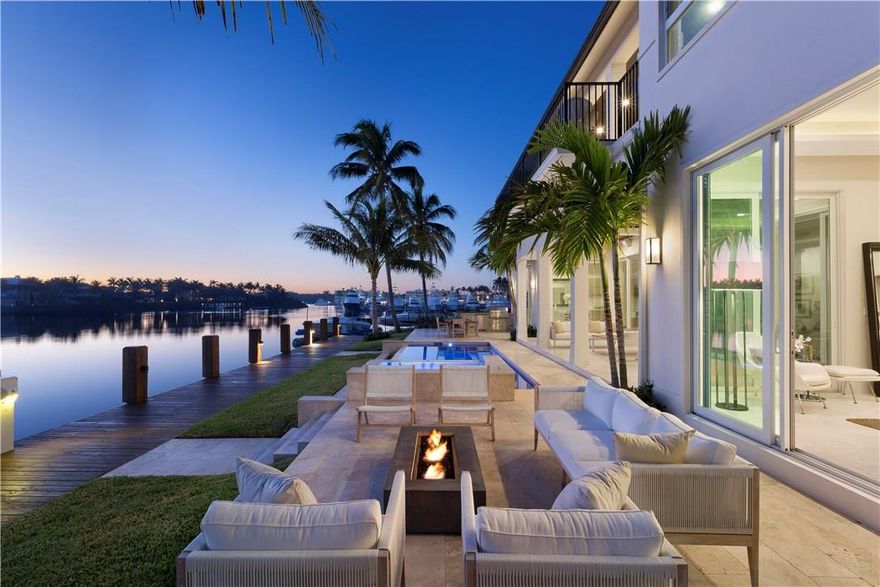 New modern coastal-inspired estate sets the scene for stylish resort-at-home living on a wide tranquil waterway. The custom-built architect-designed residence creates a fresh and airy atmosphere in fashionable interiors with walls of glass placing attention on the sweeping water scenes. All main living areas open to the outdoor entertainment space with infinity pool. A spa-like master retreat is also featured. Prime yacht dockage on 100± ft. of waterfront is only minutes from the inlet. Bring All Offers!