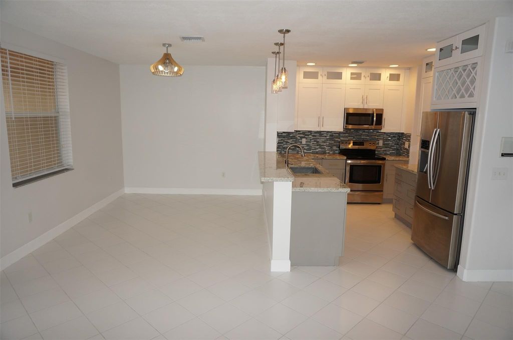 Photo of 9846 Scribner Lane, Wellington, FL 33414 (MLS # F10519434)