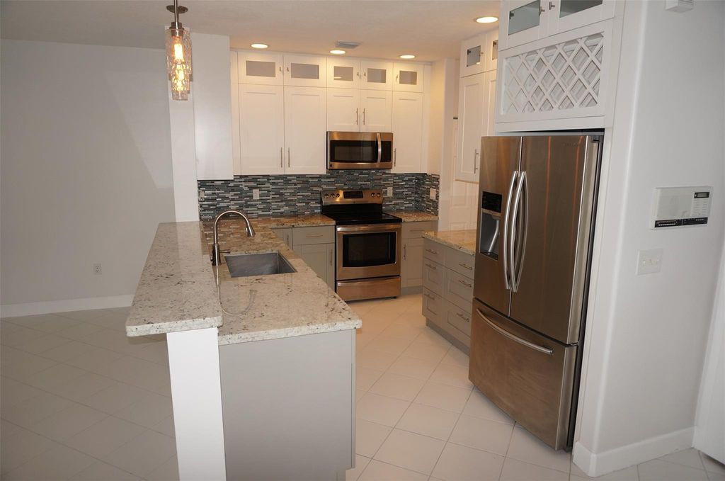 Photo of 9846 Scribner Lane, Wellington, FL 33414 (MLS # F10519434)