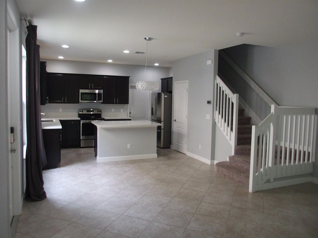 Photo of 9602 SW Purple Martin Way, Stuart, FL 34997 (MLS # R11100510)