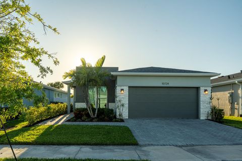 Photo of 10724 SW Gloriana Street, Port Saint Lucie, FL 34987 (MLS # R11143823)