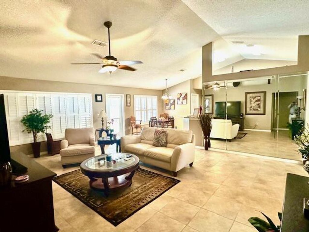 Photo of 1392 SE Odonnell Lane, Port Saint Lucie, FL 34983 (MLS # R10982860)