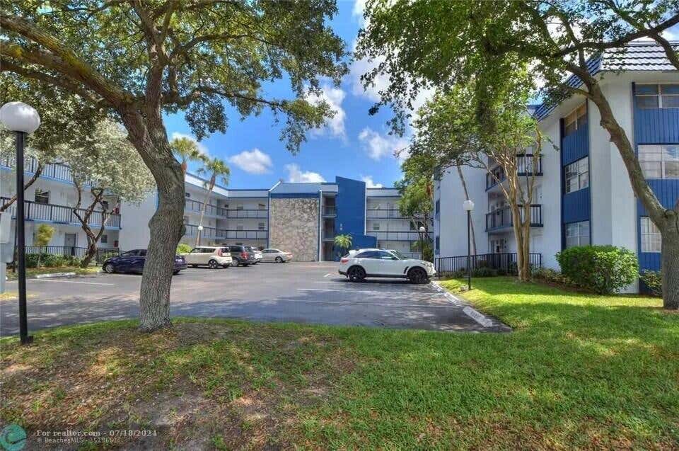 Photo of 3210 HOLIDAY SPRINGS Boulevard #2-110, Margate, FL 33063 (MLS # B26058817)