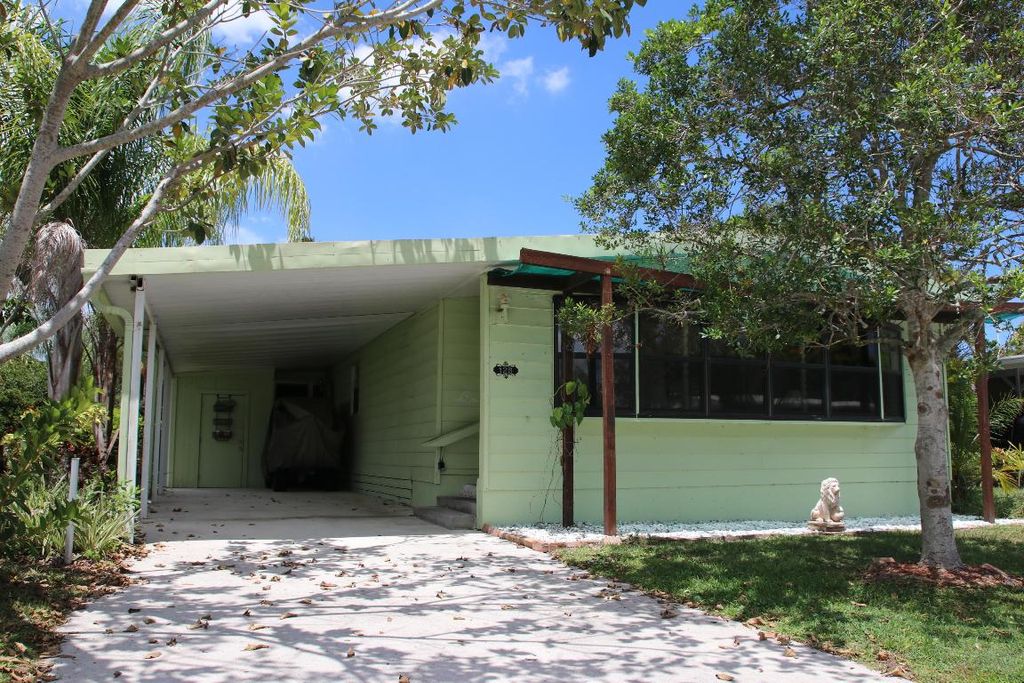 Photo of 128 W Caribbean, Port Saint Lucie, FL 34952 (MLS # R11112667)