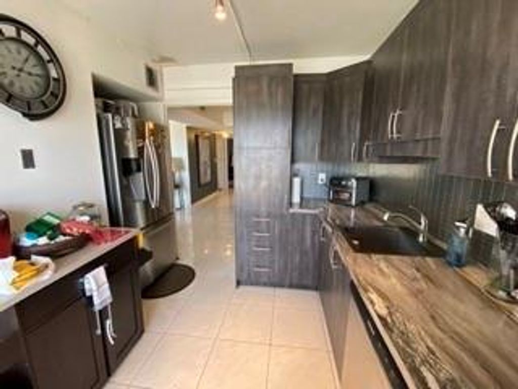 Photo of 4174 Inverrary Dr #1015, Lauderhill, FL 33319 (MLS # F10539456)