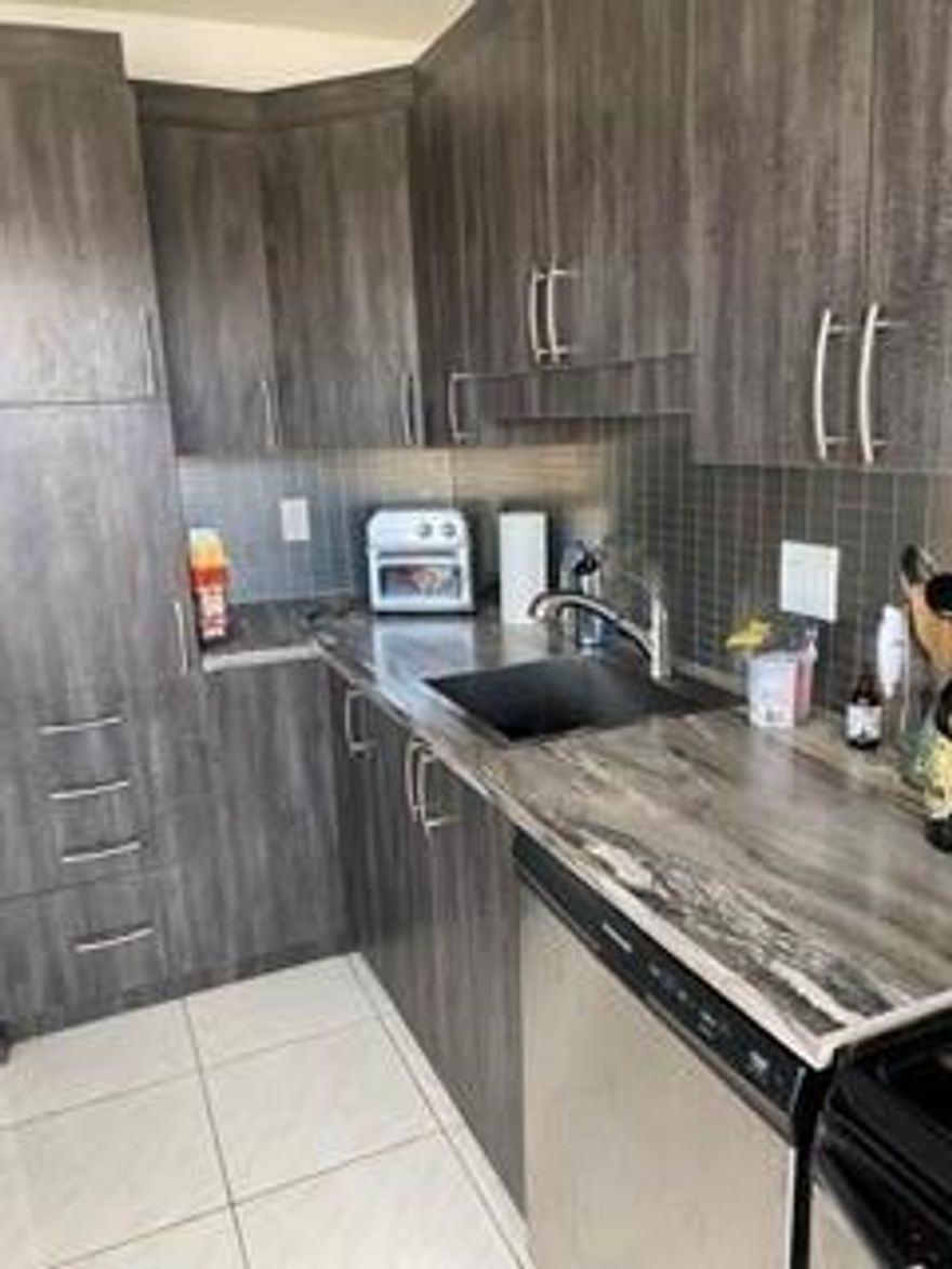 Welcome to one of the most desirable and rarely available corner units in The Manors of Inverrary—a spacious 2-bedroom, 2-bath high-rise retreat offering breathtaking 180° panoramic views of the city skyline, golf course, and endless sunsets. These corner units seldom hit the market, making this a prime opportunity for a savvy cash buyer seeking value, comfort, and long-term appreciation.
Step inside and immediately feel the openness of the bright, airy layout featuring tile and laminate wood flooring, custom paint, and an updated kitchen with modern finishes—perfect for cooking, entertaining, or simply relaxing at home. FAR BAR AS IS only

This is an all-ages community, ideal for seasonal residents, investors, or full-time Floridians looking for a peaceful, well-managed environment.