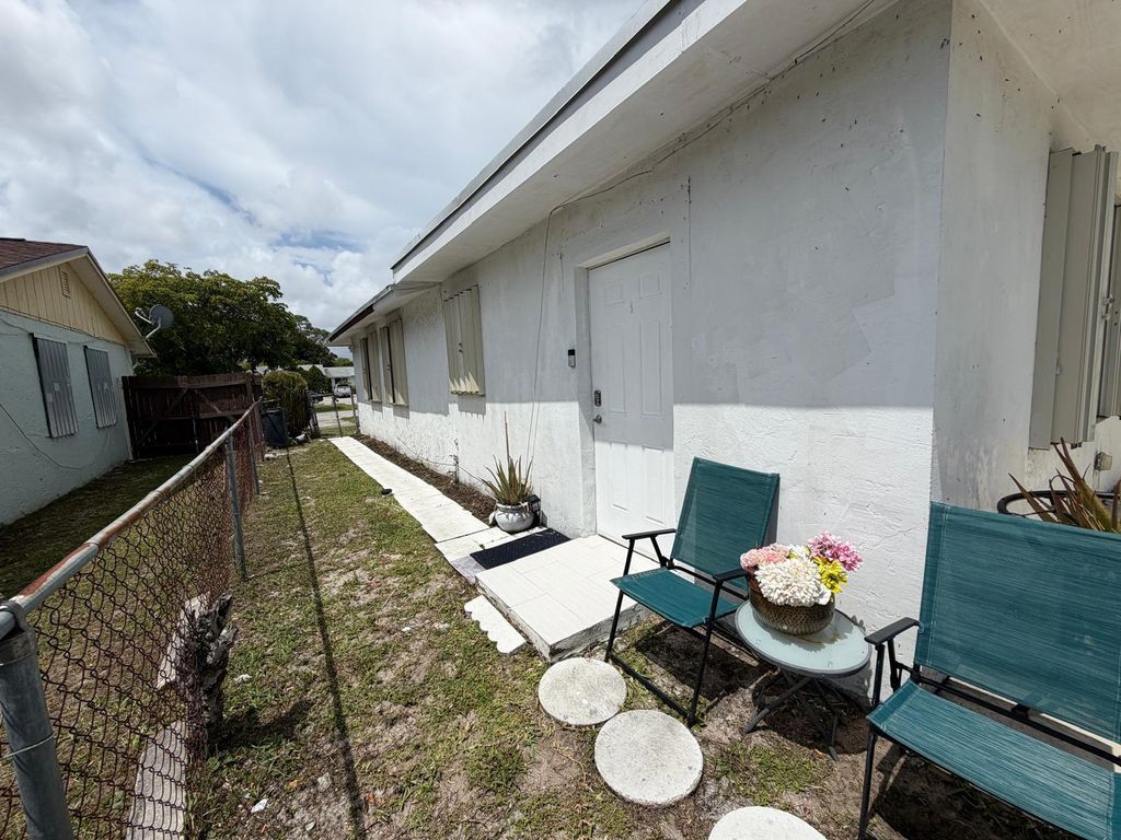 Photo of 799 E Ilene Rd Road E #A, West Palm Beach, FL 33415 (MLS # B26028960)