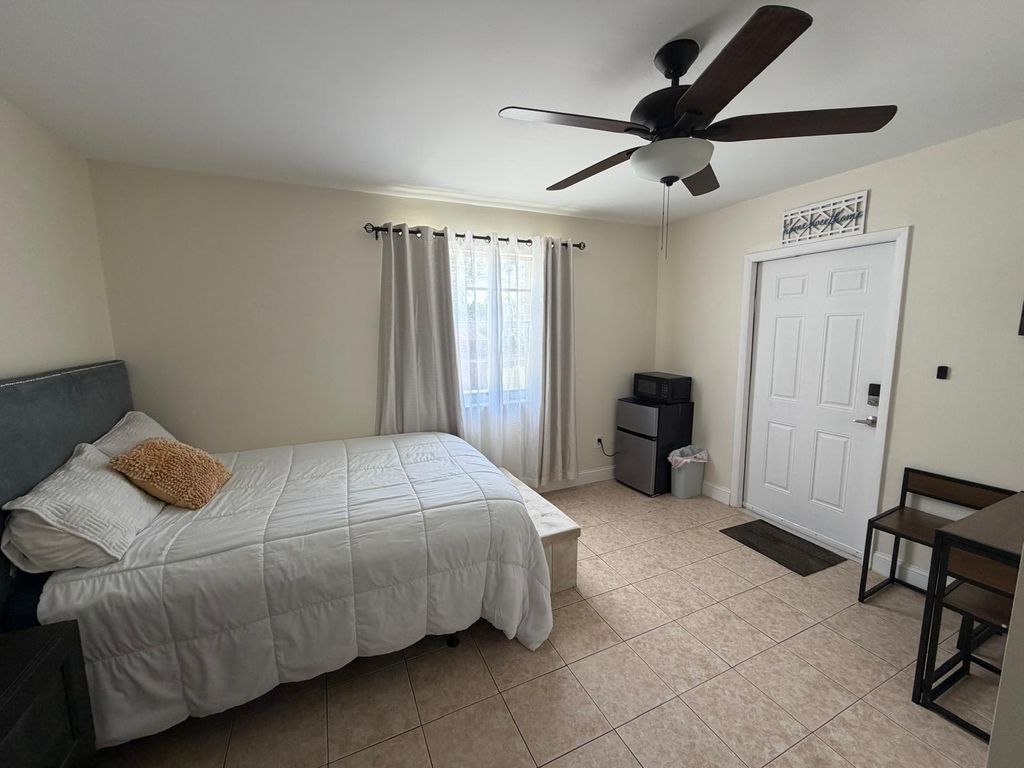 Photo of 799 E Ilene Rd Road E #A, West Palm Beach, FL 33415 (MLS # B26028960)