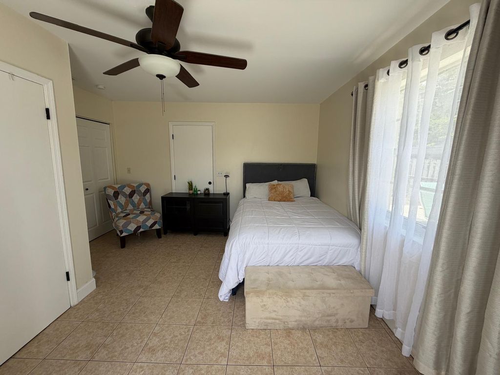 Photo of 799 E Ilene Rd Road E #A, West Palm Beach, FL 33415 (MLS # B26028960)