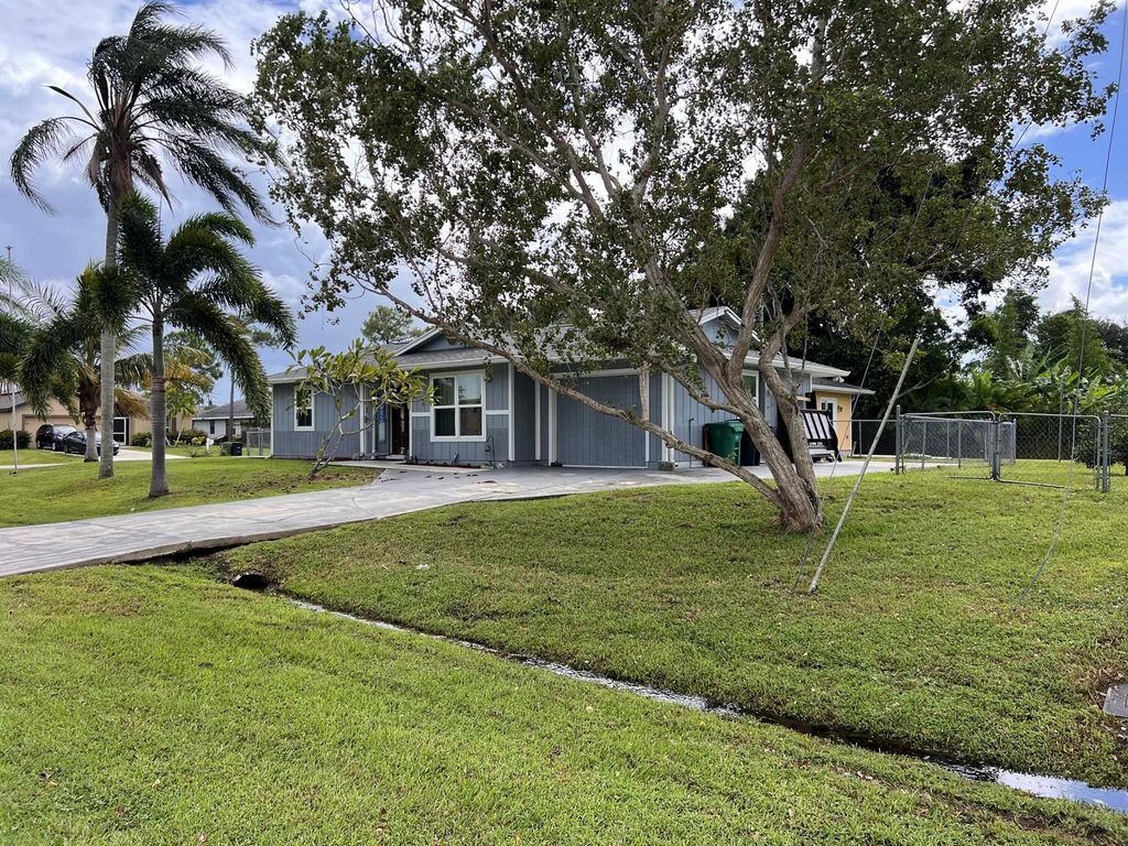 Photo of 266 SW De Gouvea Terrace, Port Saint Lucie, FL 34984 (MLS # R11131746)