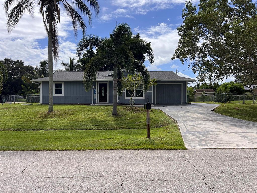 Photo of 266 SW De Gouvea Terrace, Port Saint Lucie, FL 34984 (MLS # R11131746)