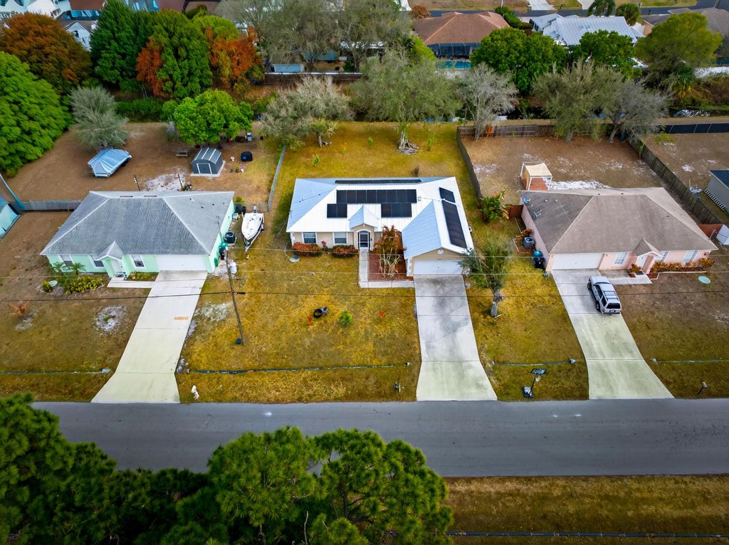 Photo of 3573 SW Kromrey Street, Port Saint Lucie, FL 34953 (MLS # R11165567)