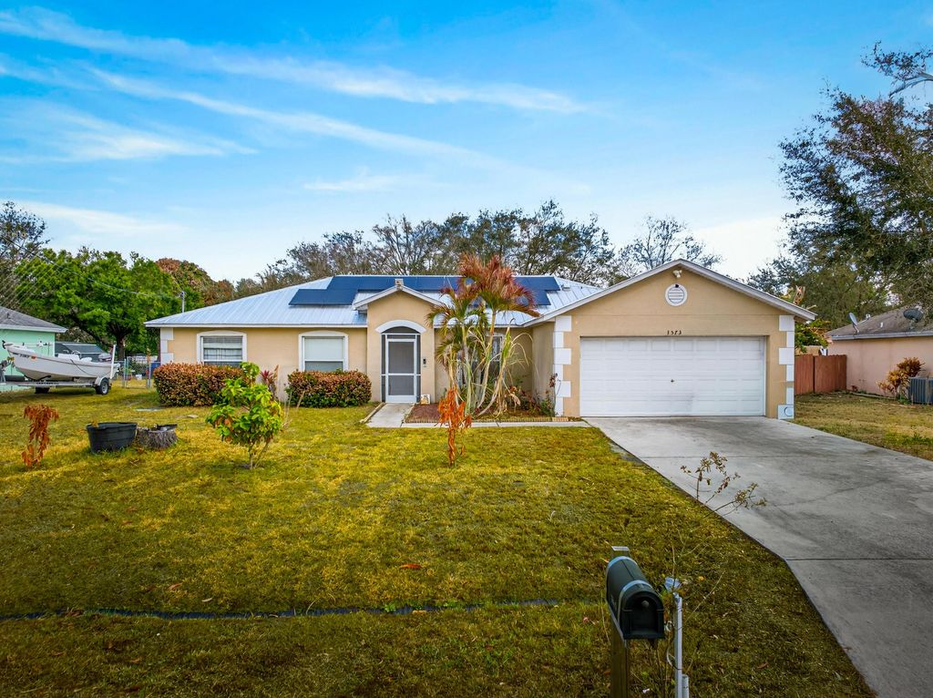Photo of 3573 SW Kromrey Street, Port Saint Lucie, FL 34953 (MLS # R11165567)
