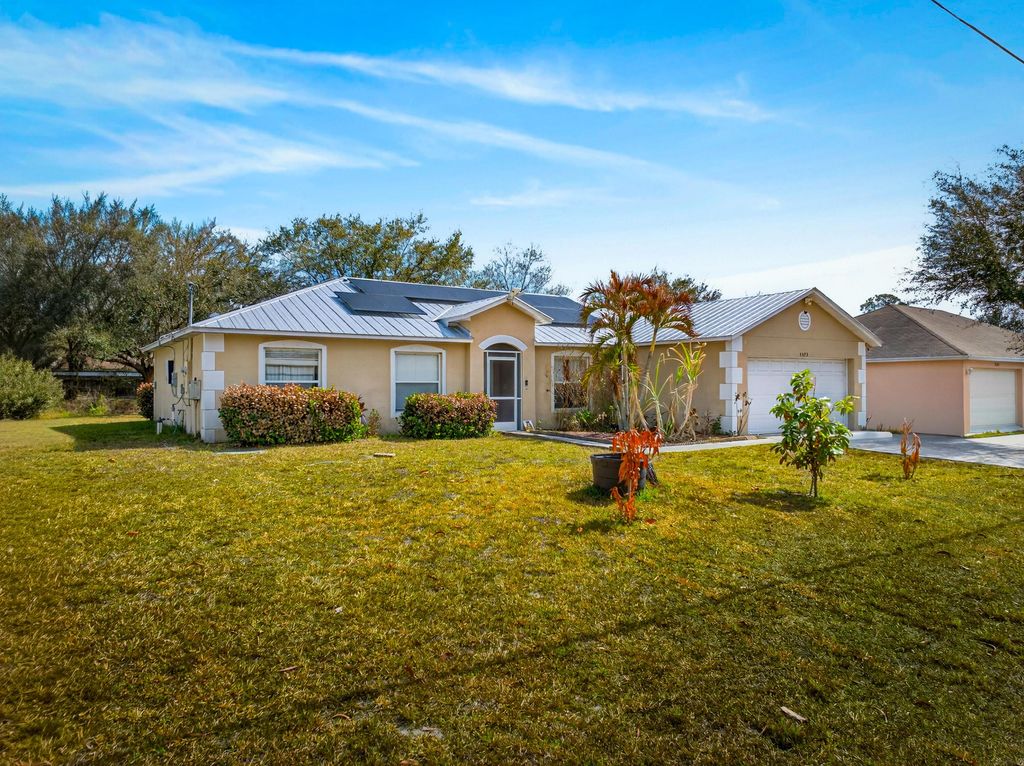 Photo of 3573 SW Kromrey Street, Port Saint Lucie, FL 34953 (MLS # R11165567)