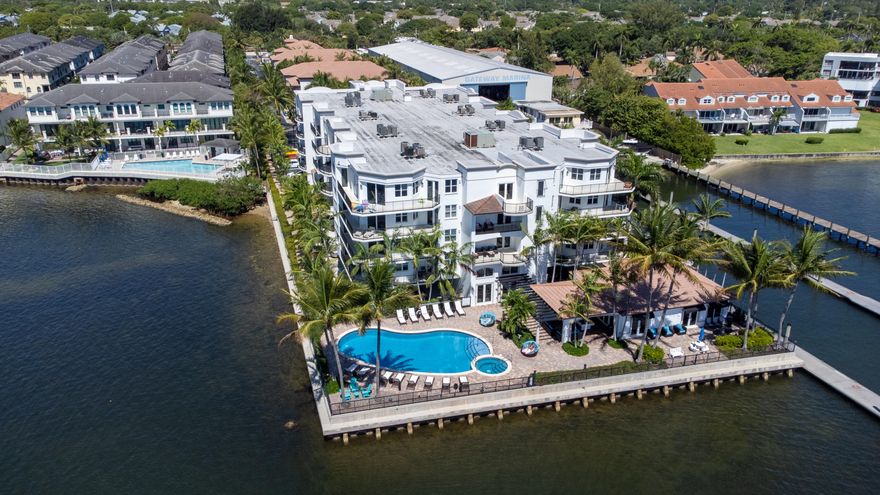 Welcome to this beautifully appointed tri-story townhouse located in a sought-after gated Intracoastal community just moments from the Boynton Inlet and adjacent to the marina. Built in 2011, this spacious residence offers the perfect blend of luxury, comfort, and coastal living. The open-concept main living area features a modern kitchen with granite counters, SS appliances,  center island, and abundant cabinet space—ideal for entertaining and everyday living. The versatile entry-level multipurpose room with a full bathroom can easily serve as a guest suite, home office, or additional bedroom. Upstairs, the expansive primary suite boasts elegant tray ceilings, walk-in closet, ensuite bathroom. Resort-style amenities -pool, spa, fitness & business center—all looking over the Intracoastal.