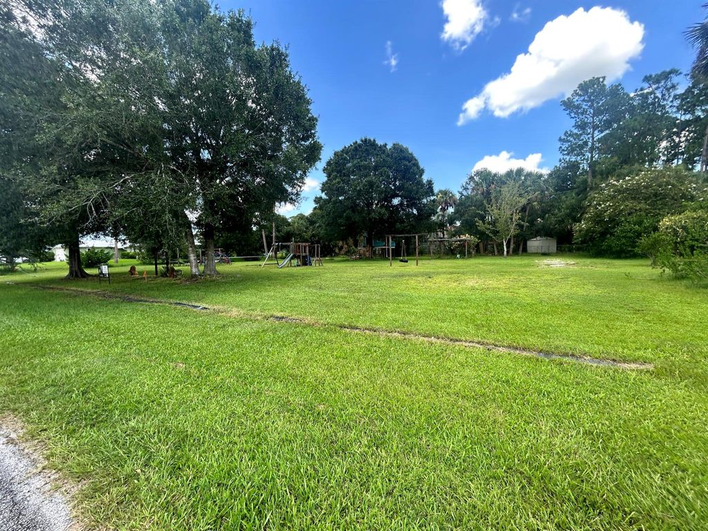 Photo of 2041 SW Driftwood Street, Port St Lucie, FL 34953 (MLS # R10886134)