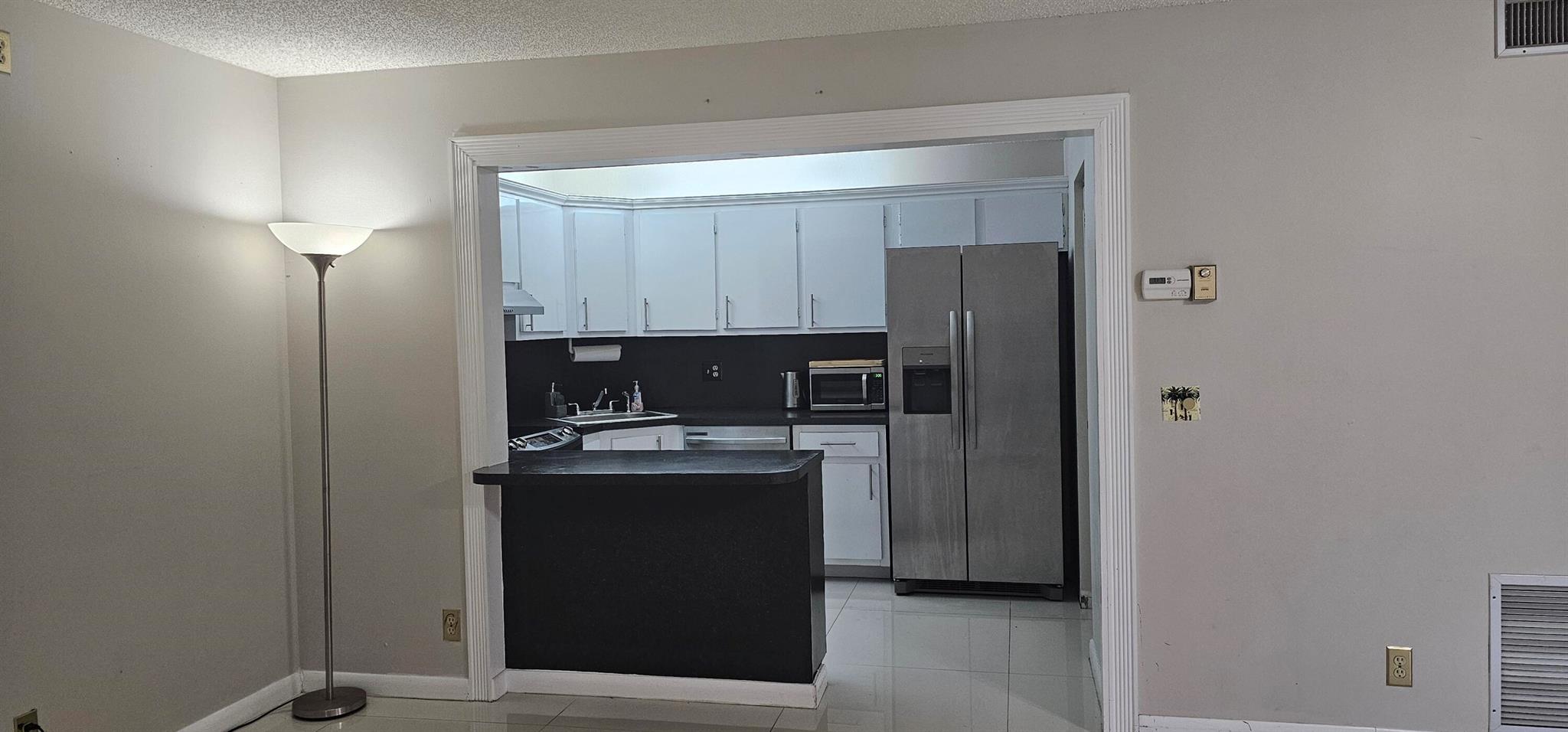 Great 2/2 second floor condo, new tile flooring, stainless steel appliances, beautiful white kitchen cabinets, spacious living room, dining area, laundry room with full size washer and dryer, both bedrooms have walk in closets, screened in porch, extra storage closet in porch. Close to Airport, turnpike , I-95, Outlets Mall, City Place. Community amenities include tennis courts, pool, club house, racquetball court, kids play area, bike/jog around the lake.