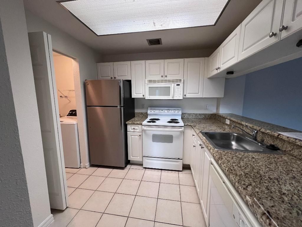 Photo of 2809 Amalei Drive #302, Palm Beach Gardens, FL 33410 (MLS # R11147622)